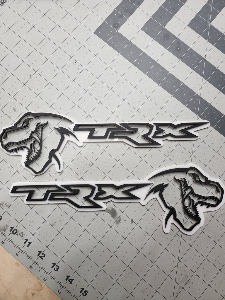 Color matched *Cutout Style* Pair of T-Rex acrylic badge (Door Installation)